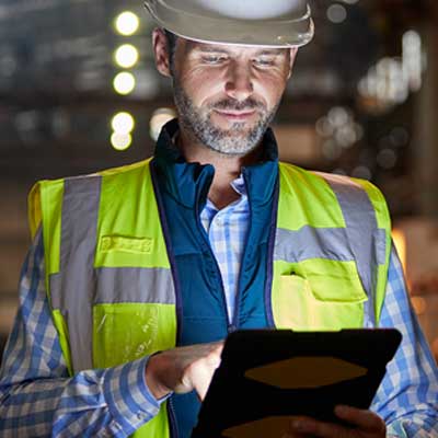 Electrician reading about PDL's product compliance