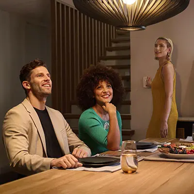 Diverse group of individuals gathered around a table.