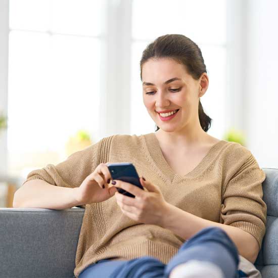 'lady looking at electric home design magazine