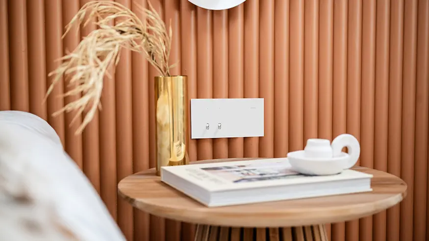 Solis white ceramic wall switch.