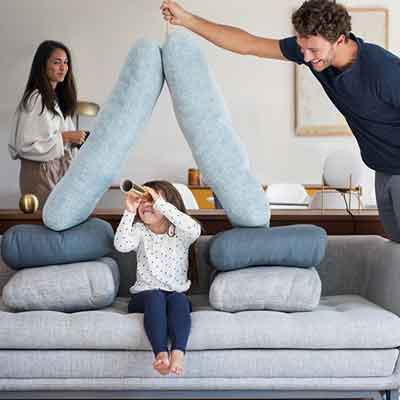 Family playing in their home