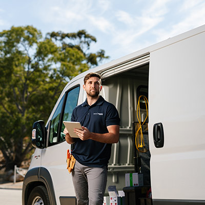 Electrician with iPad, ready to work on-the-go