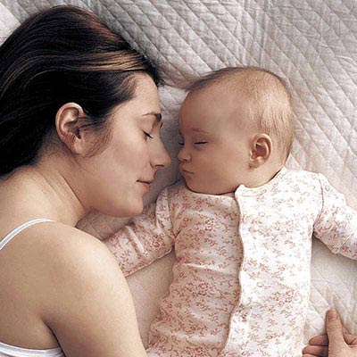 Mother and child sleeping safely