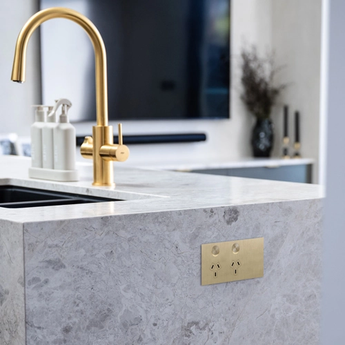 'Solis brass power outlet in the kitchen